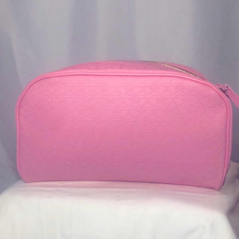 SHANE X JEFFREE pink double zip make up bag with a pig print design.